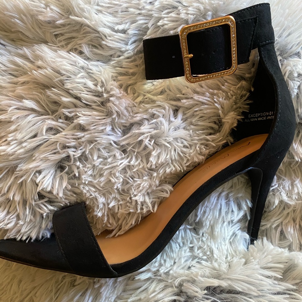 Black Anne Mitchelle heels cute and comfortable.